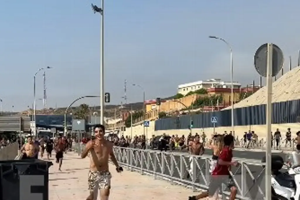 Alerta por miles de inmigrantes que escapan de la Guardia Civil en Ceuta, España (+Video)
